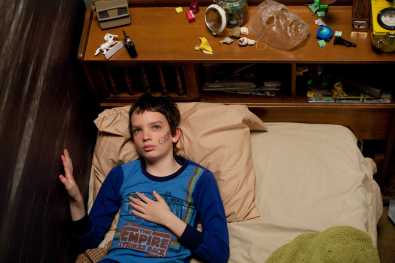 LMI Owen & Abby tap out Morse code messages through the wall that seperates them