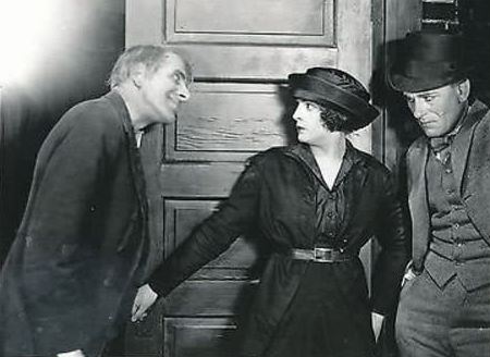 Priscilla Dean as Mary Stevens in The Wicked Darling, with Spottiswoode Aitken (l.) and Lon Chaney (r.)